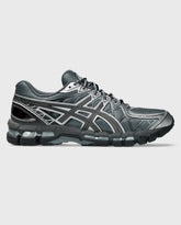 Asics Gel-Kayano 20 hardloopschoen grijs met zwarte zoolrand en zijlogo's