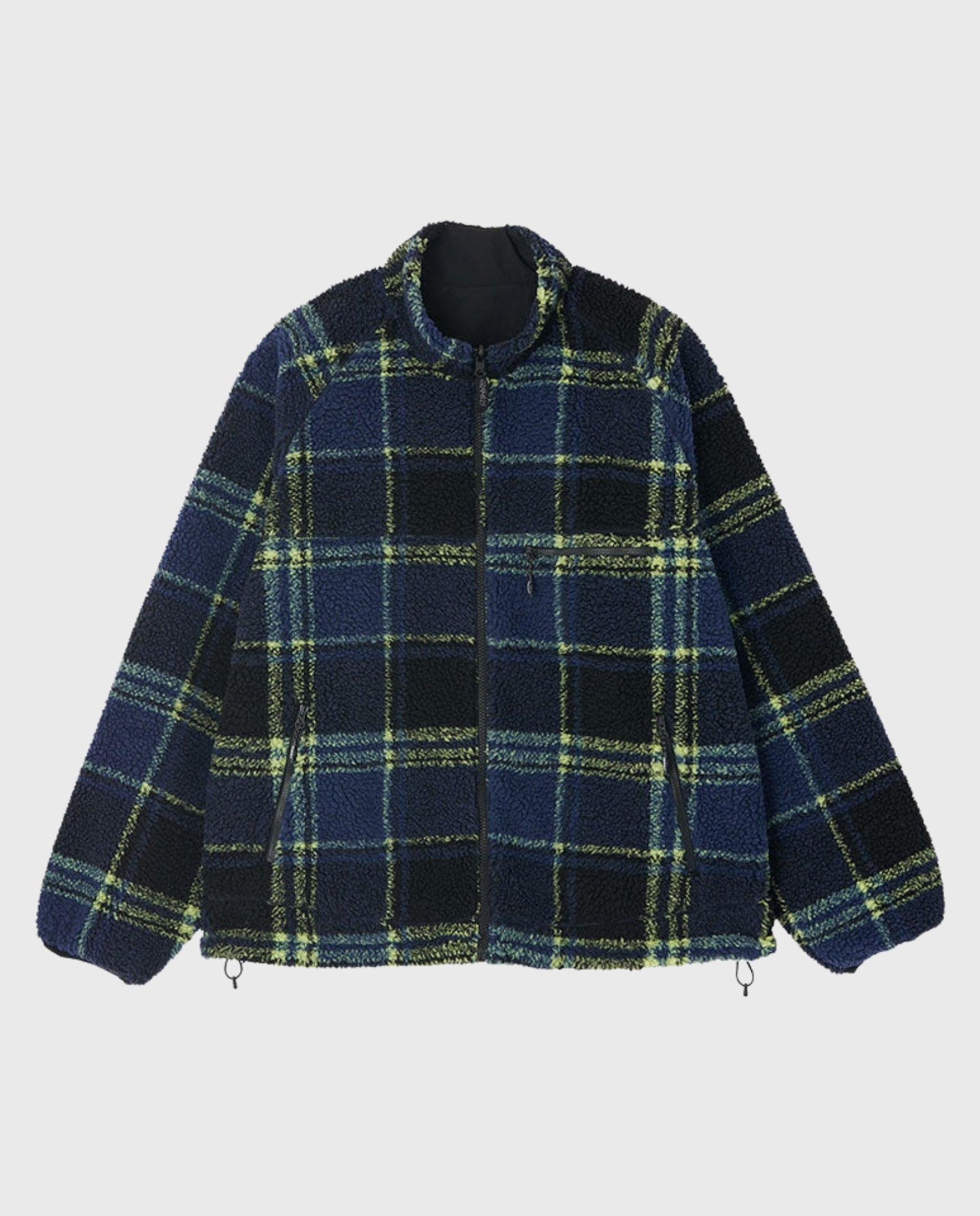 Reversible sherpa jas met donkerblauwe en groen-gele ruit, opstaande kraag en rits