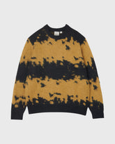 Mohairtrui met saffraanspetterprint op donkerblauwe achtergrond, ronde hals en ribboorden.