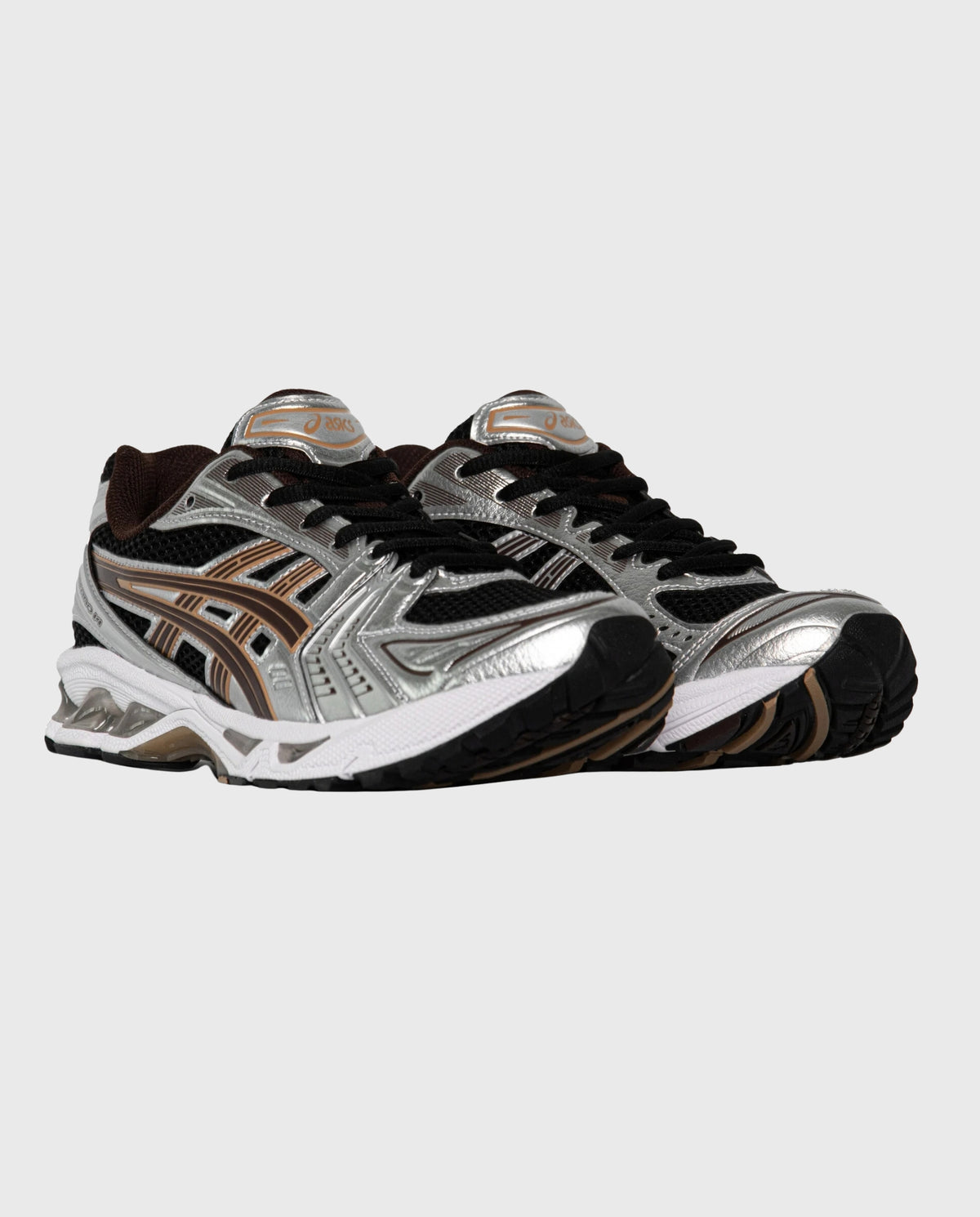 Asics Gel-Kayano 14 hardloopschoen zwart/zilver met bruine accenten, veters en mesh