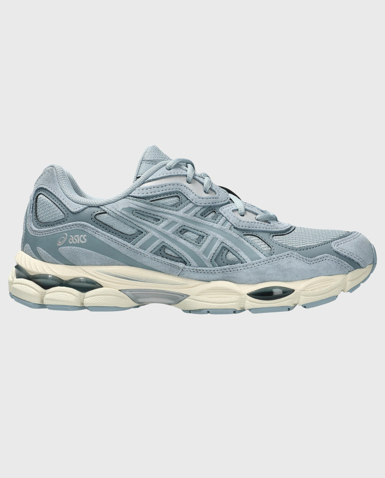 Hardloopschoen lichtblauw/grijs met gestreept design en witte/crèmekleurige tussenzool