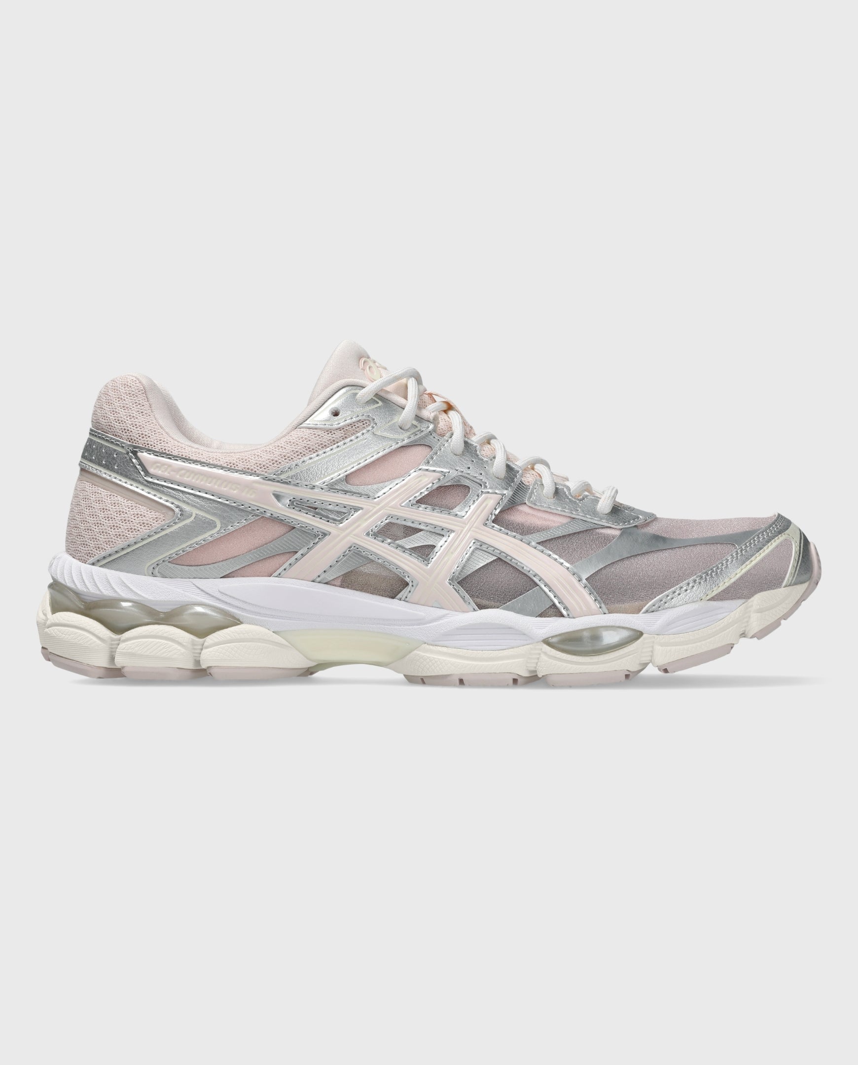 Asics hardloopschoenen langszijaanzicht lichtroze/zilver met geprofileerde zool