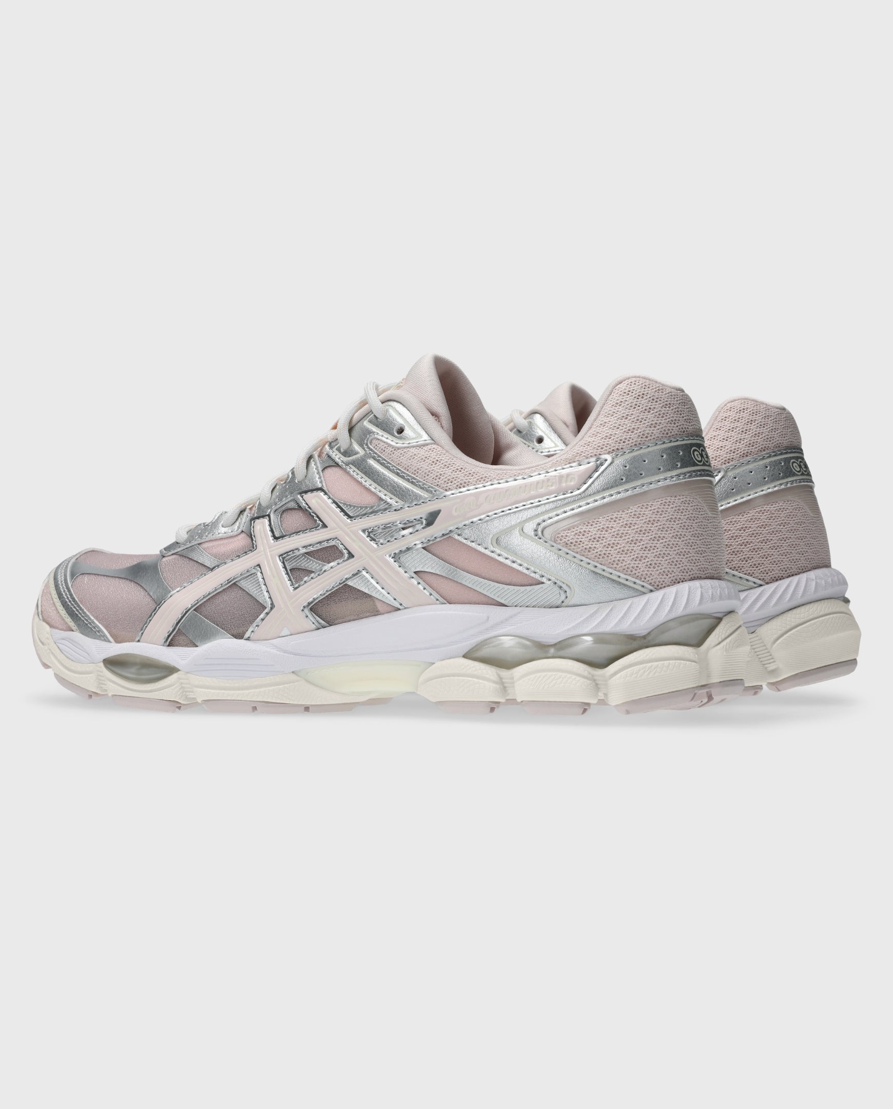 Asics hardloopschoenen lichtroze/zilver met zijpaneel en witte tussenzool