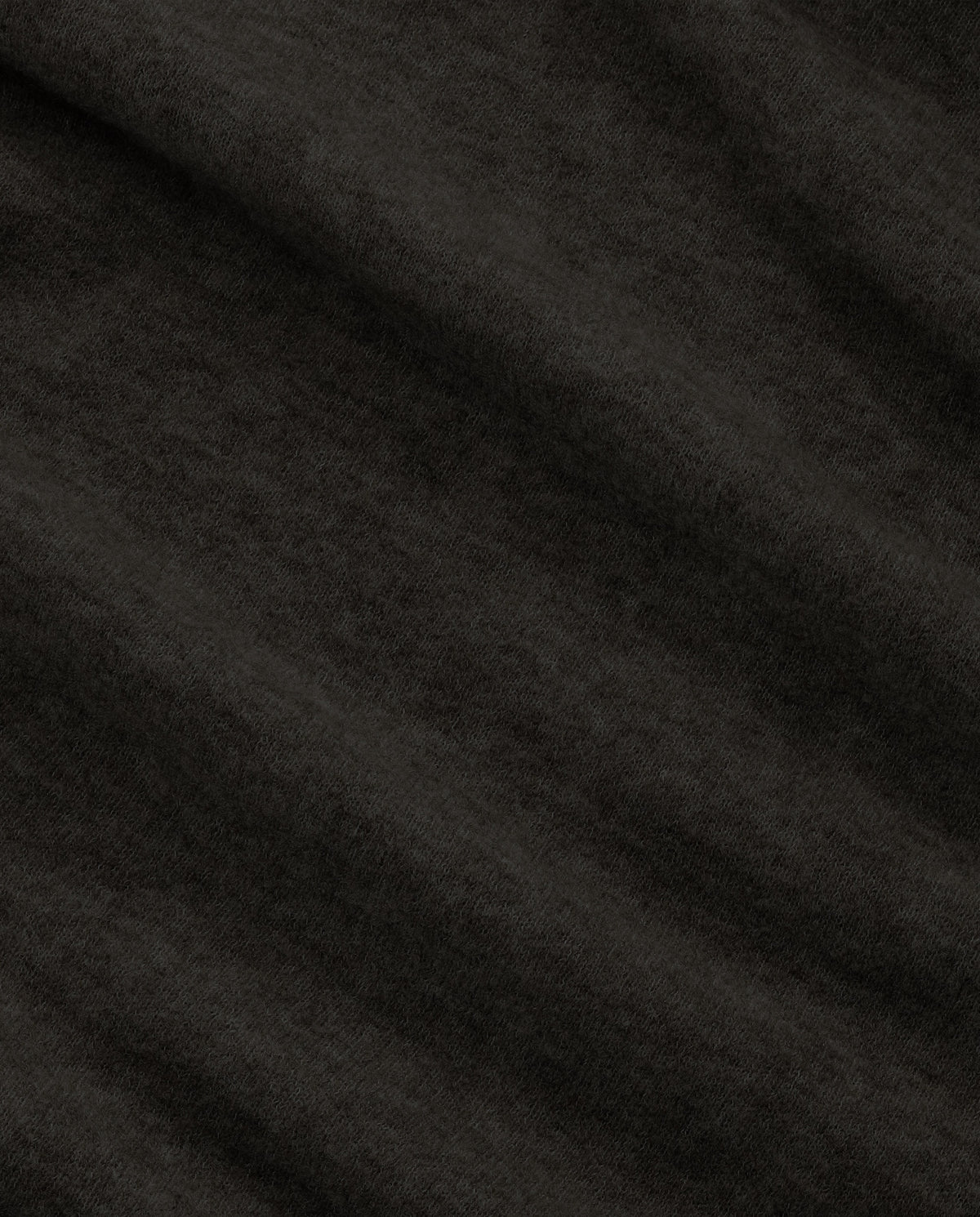 Effen donkergroene gebreide stof, close-up met fijne textuur