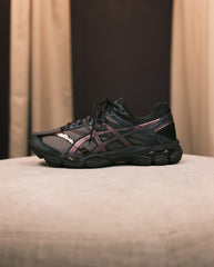 Asics hardloopschoen Gel-Cumulus 16 in donker groen/zwart met roze stiksels