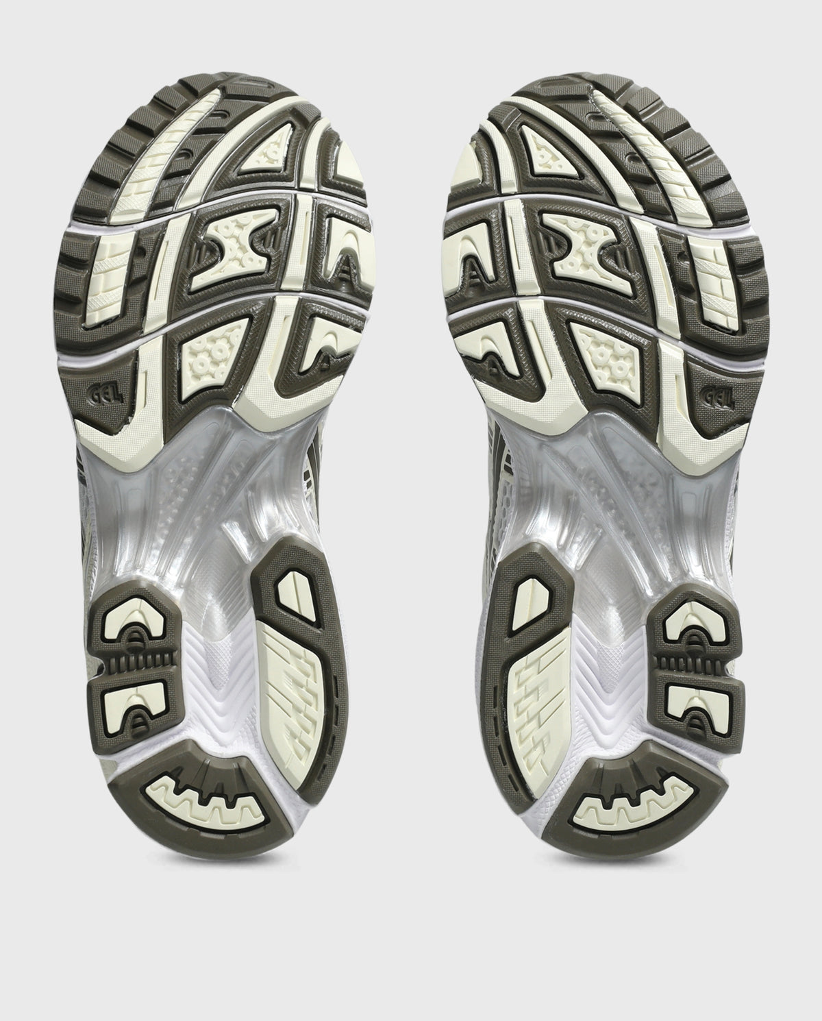 Schoenzool van witte ASICS Gel-Kayano 14 sneaker met grijze noppen en profiel