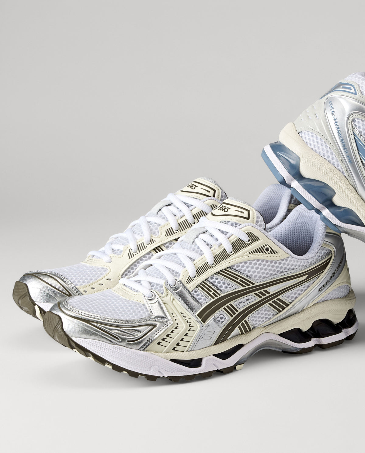 ASICS Gel-Kayano 14 sneaker met witte mesh, ivoorkleurige banden, veters en zwarte hiel
