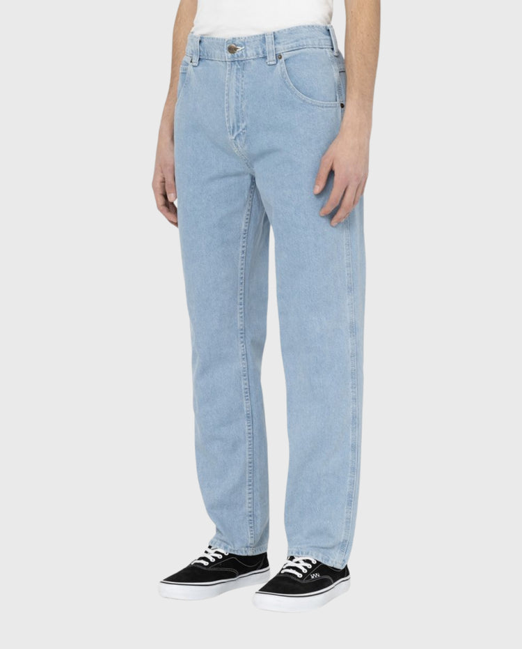 Blauwe denim jeans vooraan met gulp, knoopsluiting en steekzakken