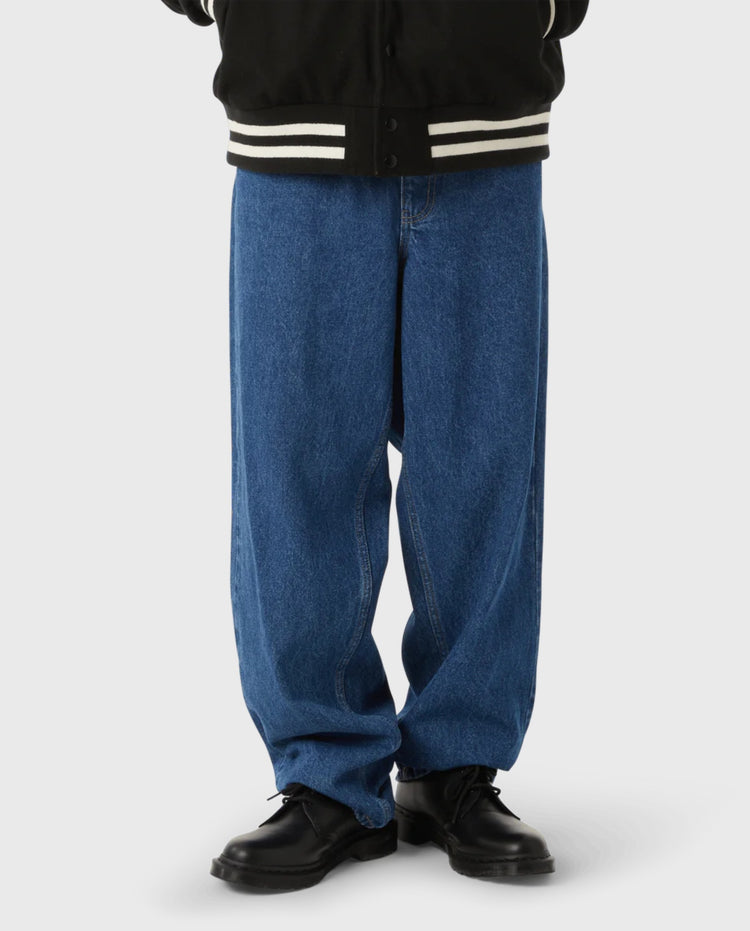 Wijde stonewash denim pantalon in indigo blauw, rechte pijpen, zichtbare naden.