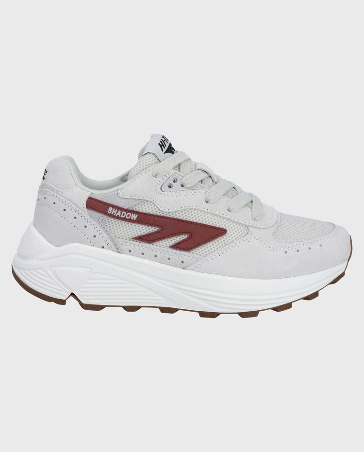 Witte Hi-Tec sneakers met rode zijlogo en dikke witte zool