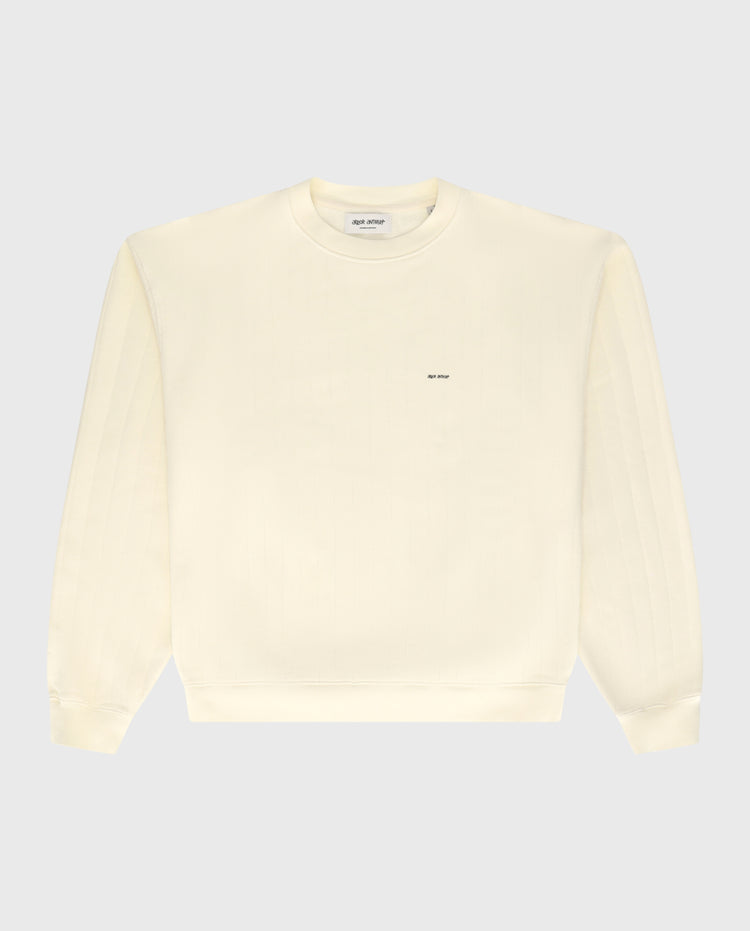 Crème crewneck sweater met klein borstlogo en ronde hals