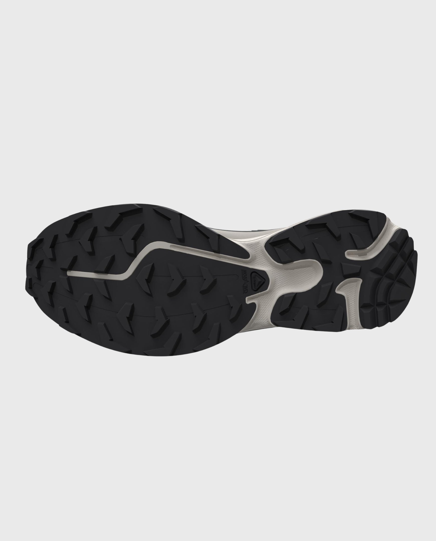 Buitenzool van Salomon XT-6 sneaker met zwarte noppen en grijze randen.