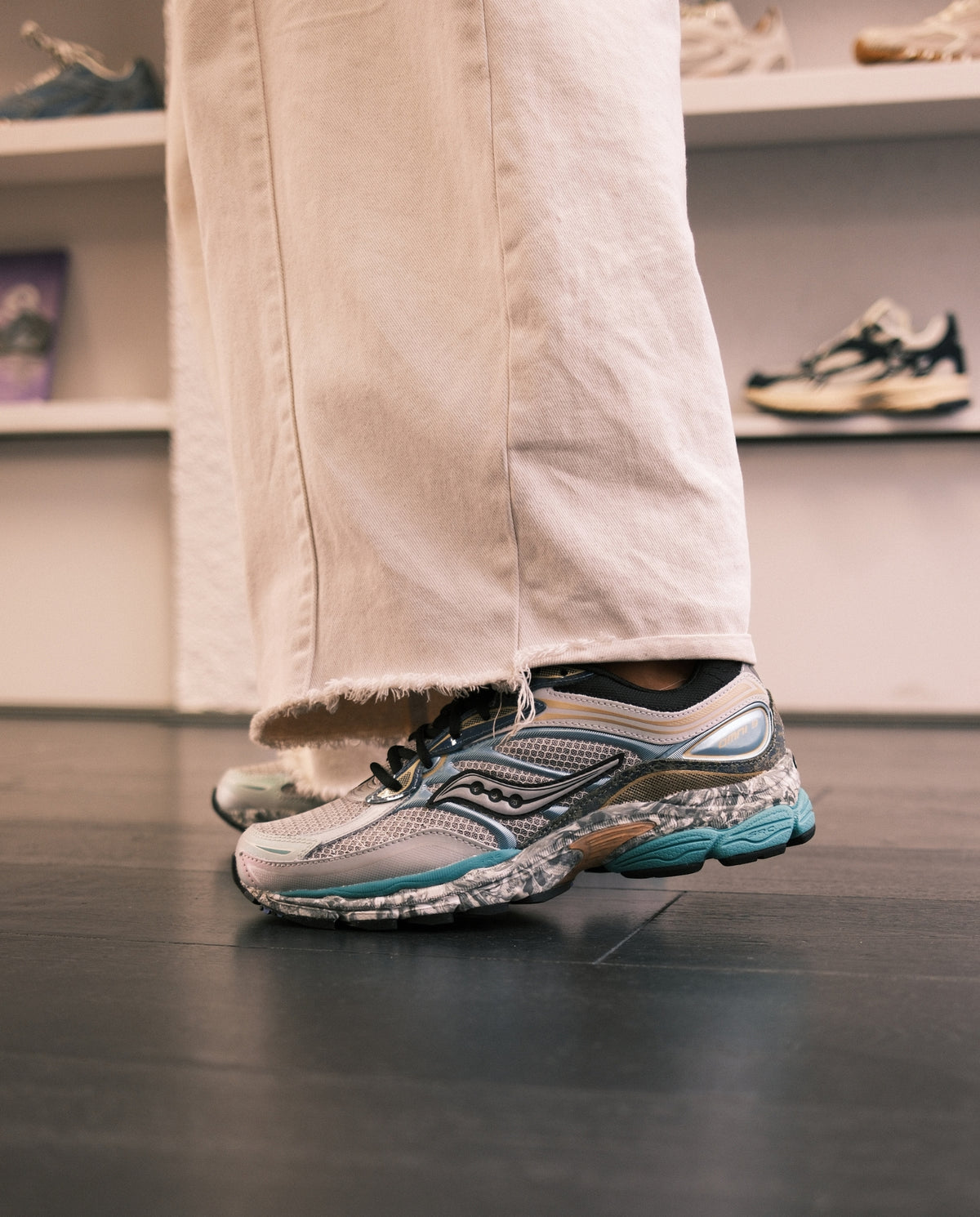 Saucony hardloopschoen: blauw/teal mesh, gedetailleerde zool