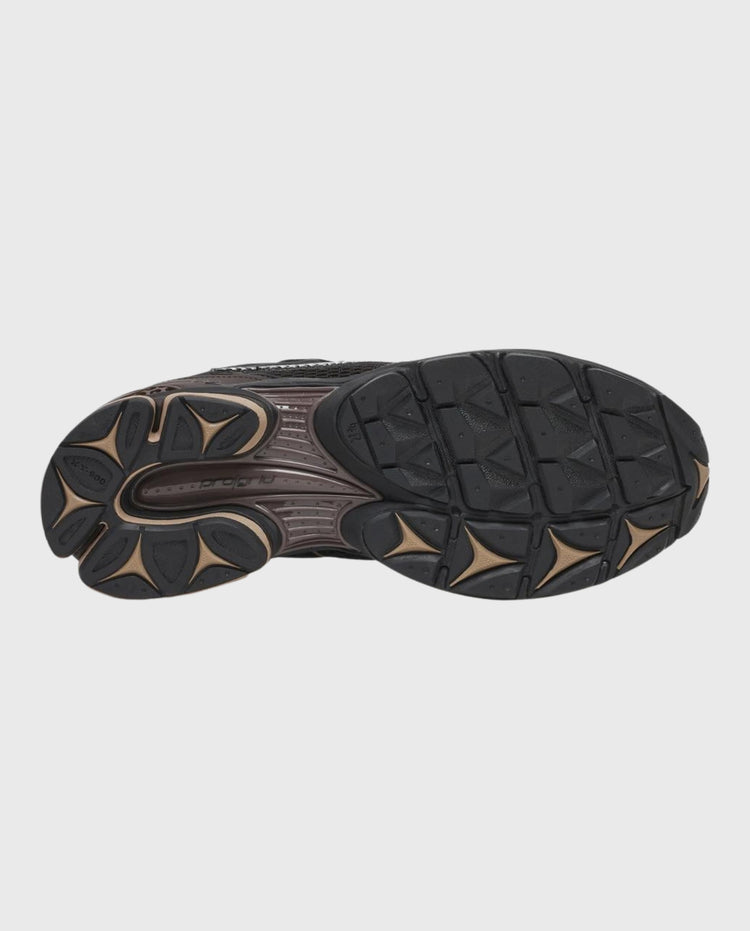 Saucony hardloopschoenen profielzool met rubber noppen en donkergrijze buitenkant