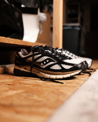 Saucony hardloopschoen Progrid Guide 7, zwart-wit met gele accenten, laag model