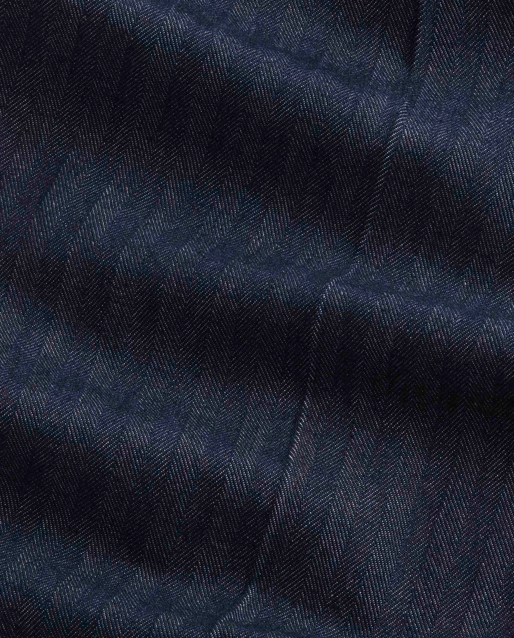 Donkerblauwe denimstof met visgraatmotief
