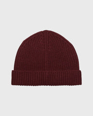 Reversibele beanie in donkerrode, geribde rand en gebreide muts.
